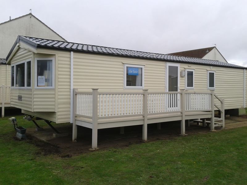 The new caravan safely in place ready for being connected up.